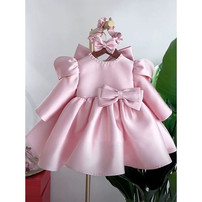 Partykleid mit Schleife und Perlen für Kinder