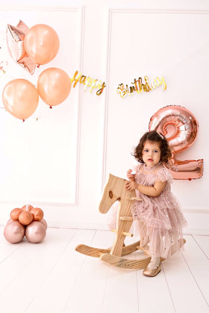 Children's party dress with lace ruffles and stars