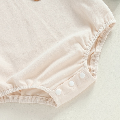 Children's bodysuit with brown pocket