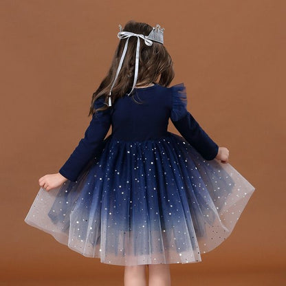 Children's dress with tulle skirt and glitter