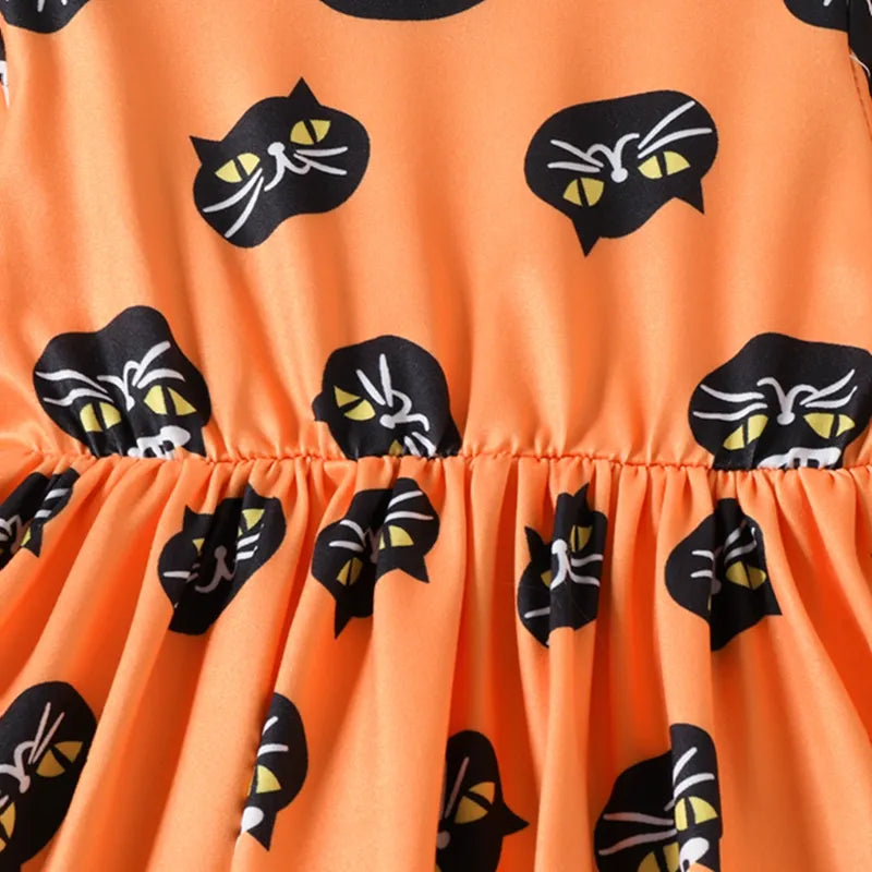 Orange children's dress with black cat