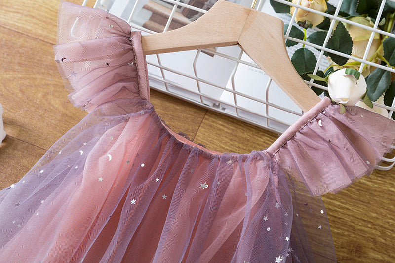 Children's dress in delicate tulle with glitter