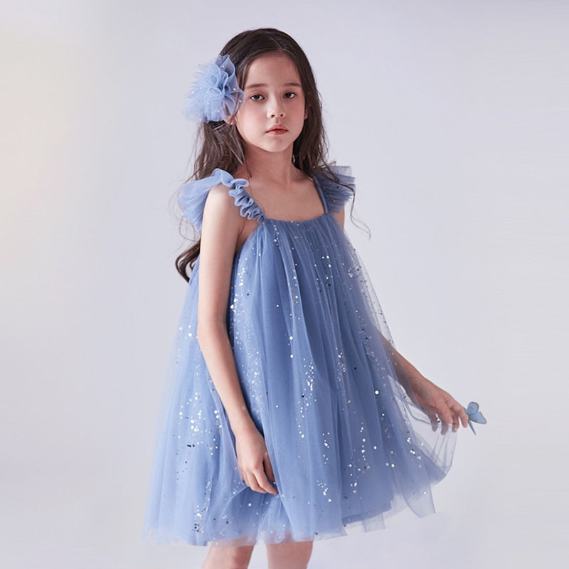 Children's dress in delicate tulle with glitter