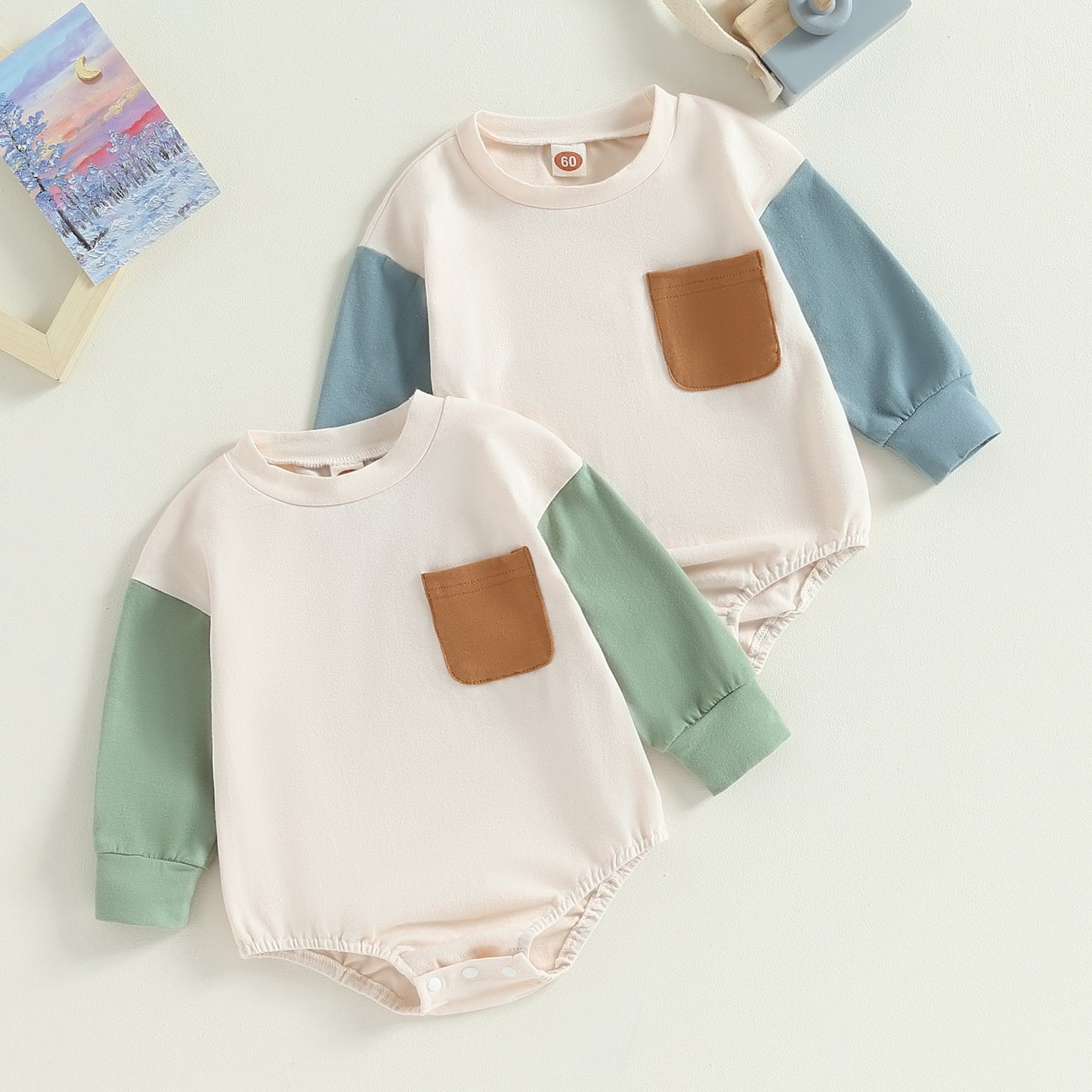 Children's bodysuit with brown pocket