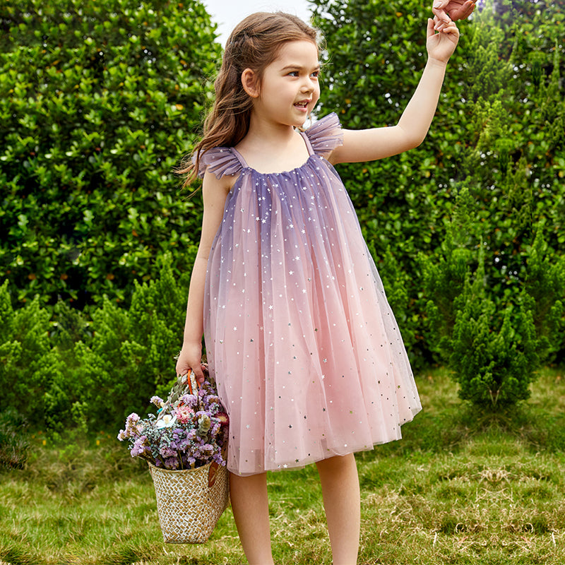 Children's dress in delicate tulle with glitter