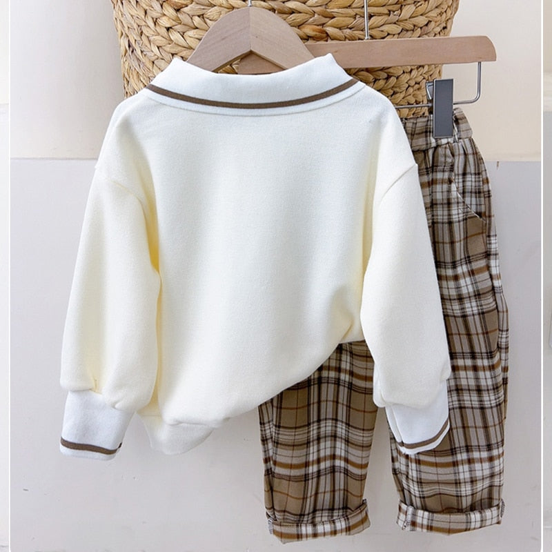 Children's set boy blouse with collar and plaid pants