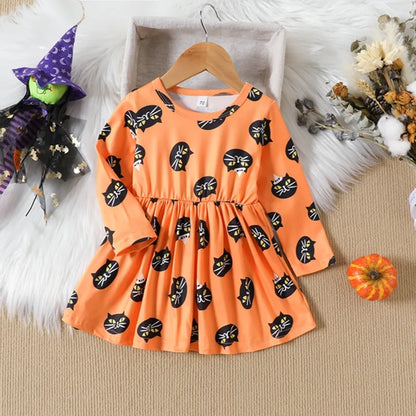 Orange children's dress with black cat