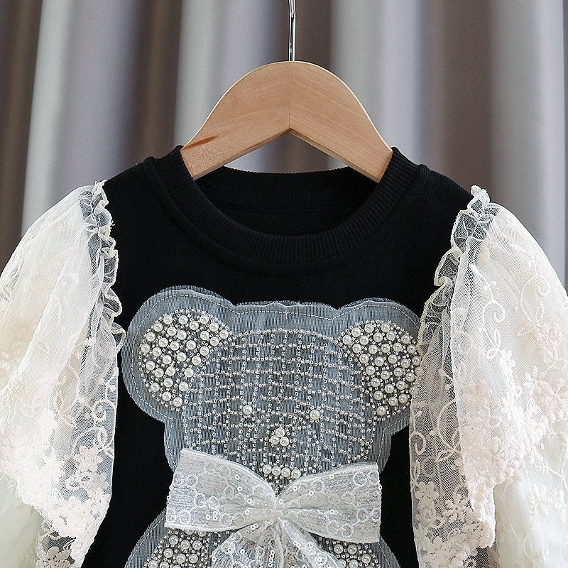 Children's dress with bear and lace