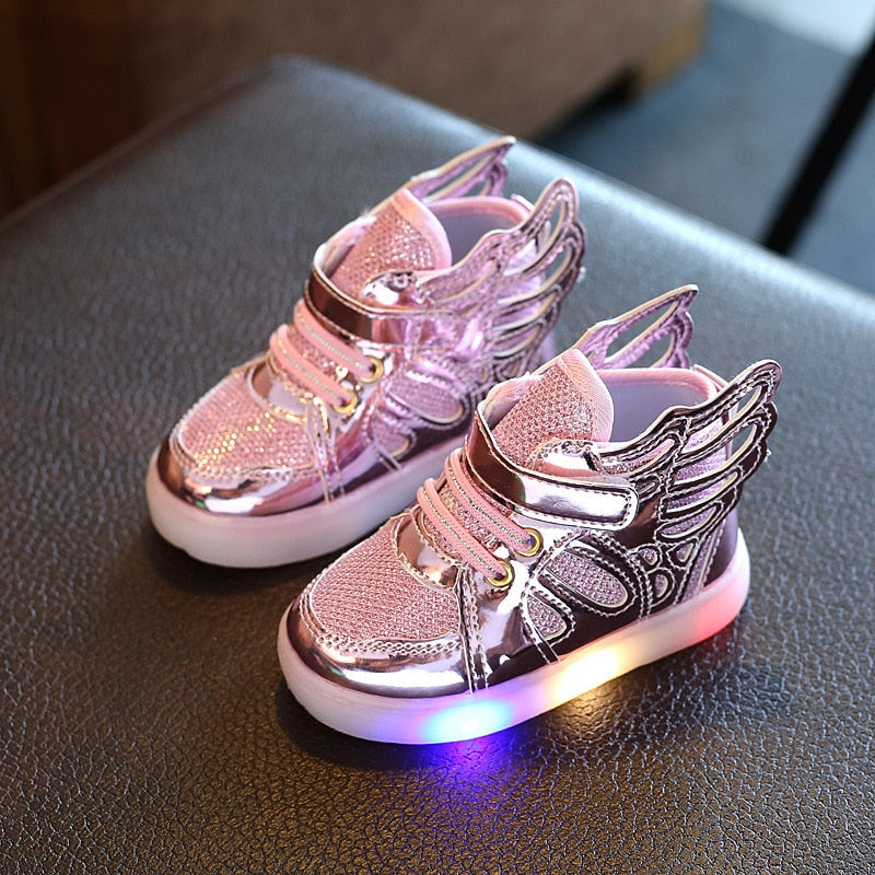 Children's shoe with wing and LED