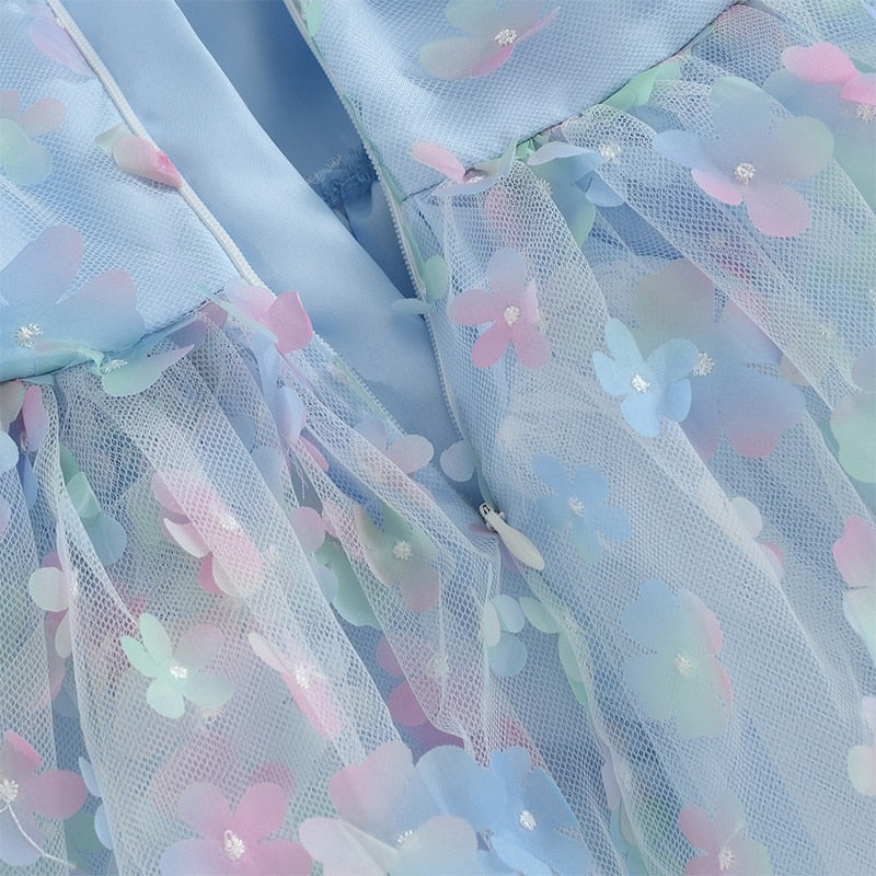 Children's blue tulle dress with colorful flowers