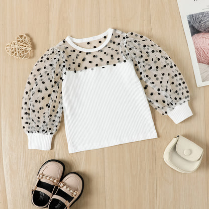 Children's set with ball blouse and black pants