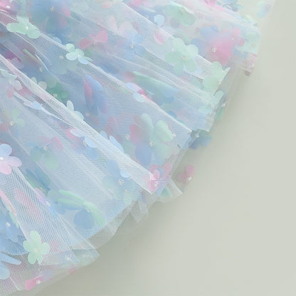 Children's blue tulle dress with colorful flowers