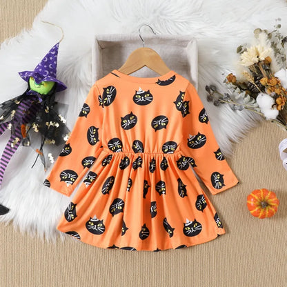 Orange children's dress with black cat