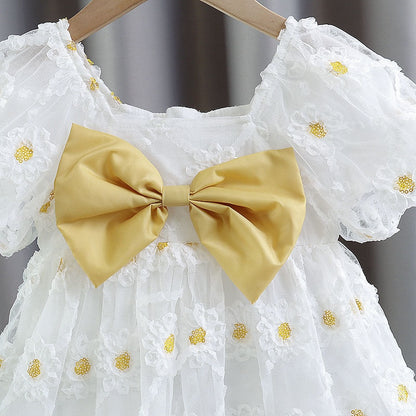 Children's dress with yellow bow