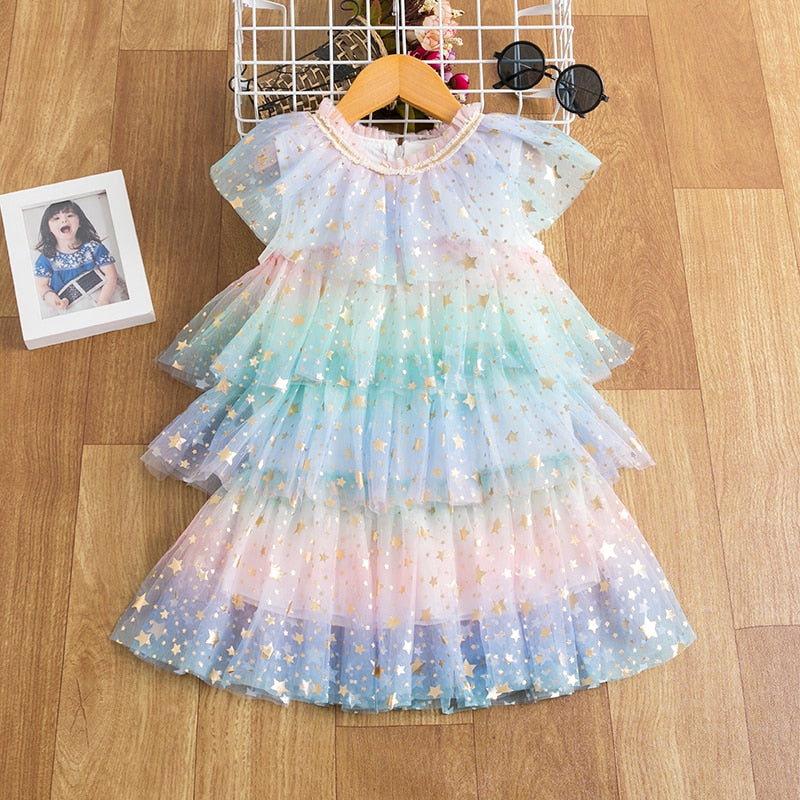 Children's party dress with lace ruffles and stars