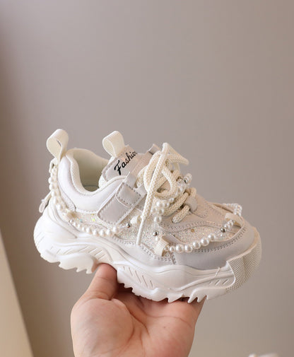 Children's sneakers with glitter and pearls