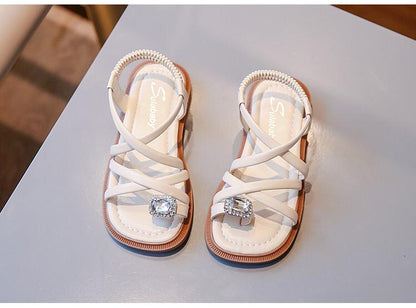 Children's sandal braided with shiny stone