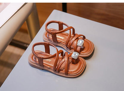 Children's sandal braided with shiny stone