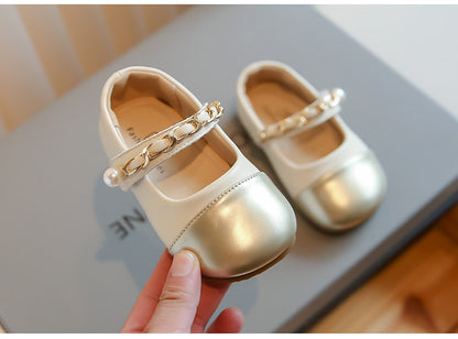 Children's shoe with metallic