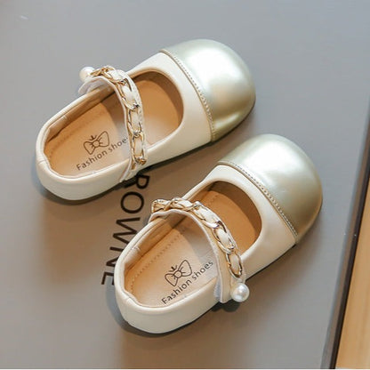 Children's shoe with metallic