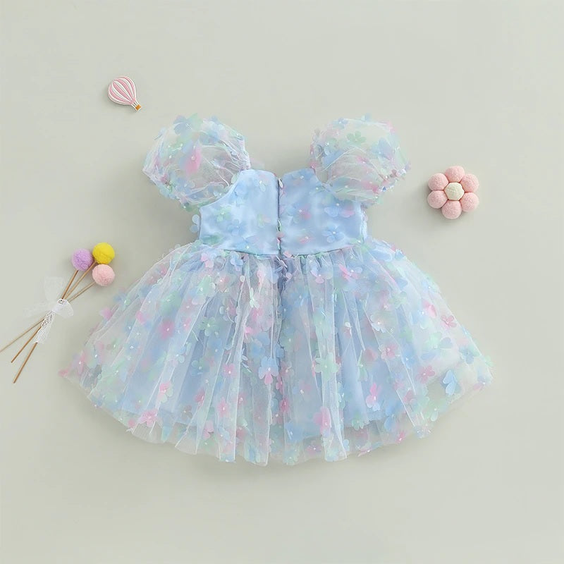 Children's blue tulle dress with colorful flowers