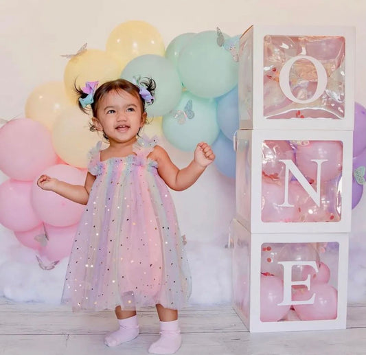 Delicate children's dress with tulle and little stars