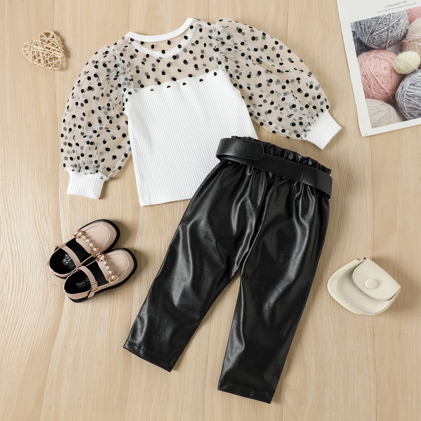 Children's set with ball blouse and black pants