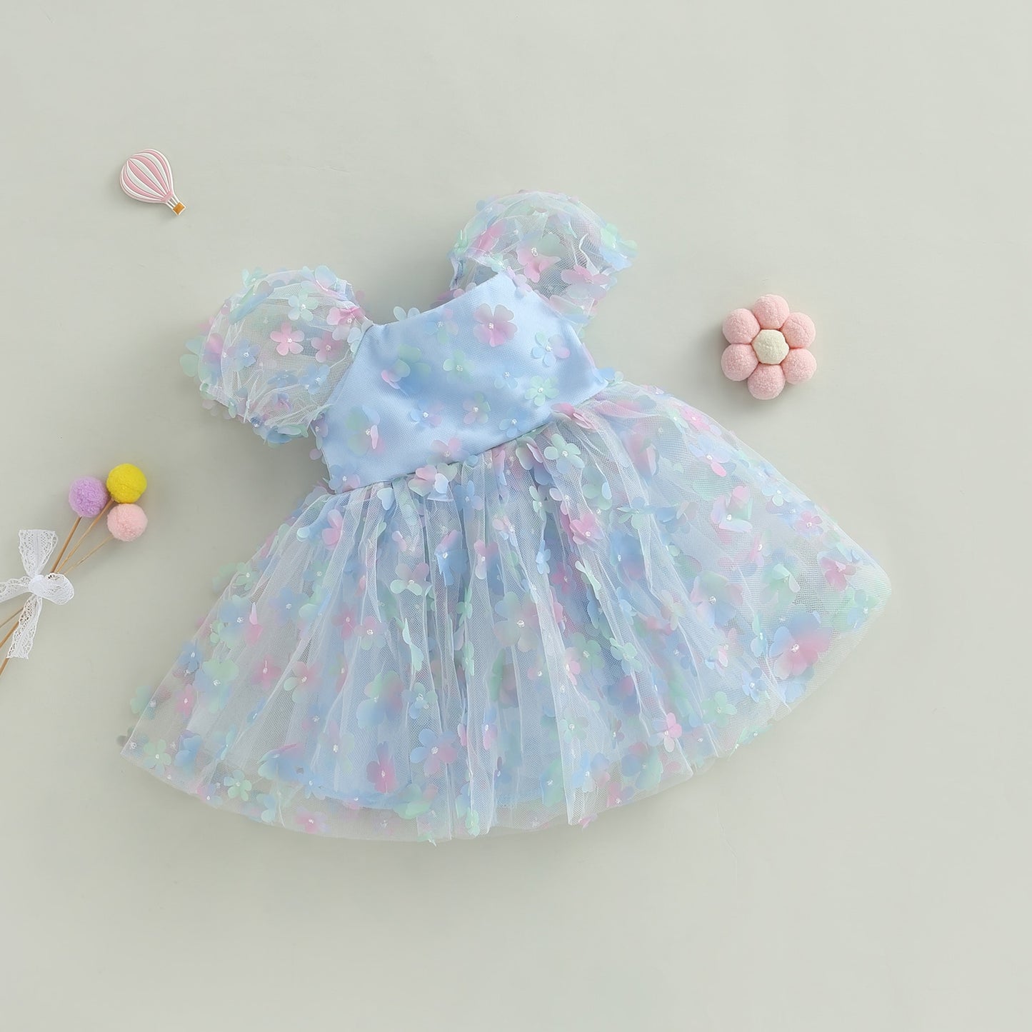 Children's blue tulle dress with colorful flowers